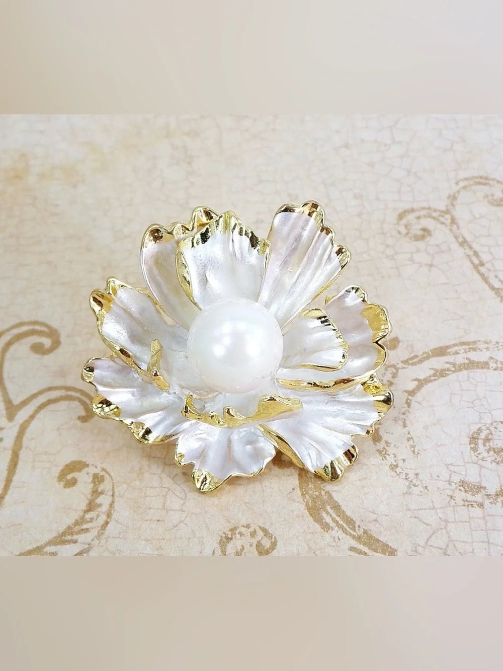 White Flower Brooch Pin with pearl center and gold trim. White floral fashion
